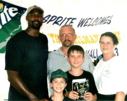 We met Karl Malone! (Clockwise from left to right: Karl Malone, John, Lee Ann, Johnny & Patrick Hamm)